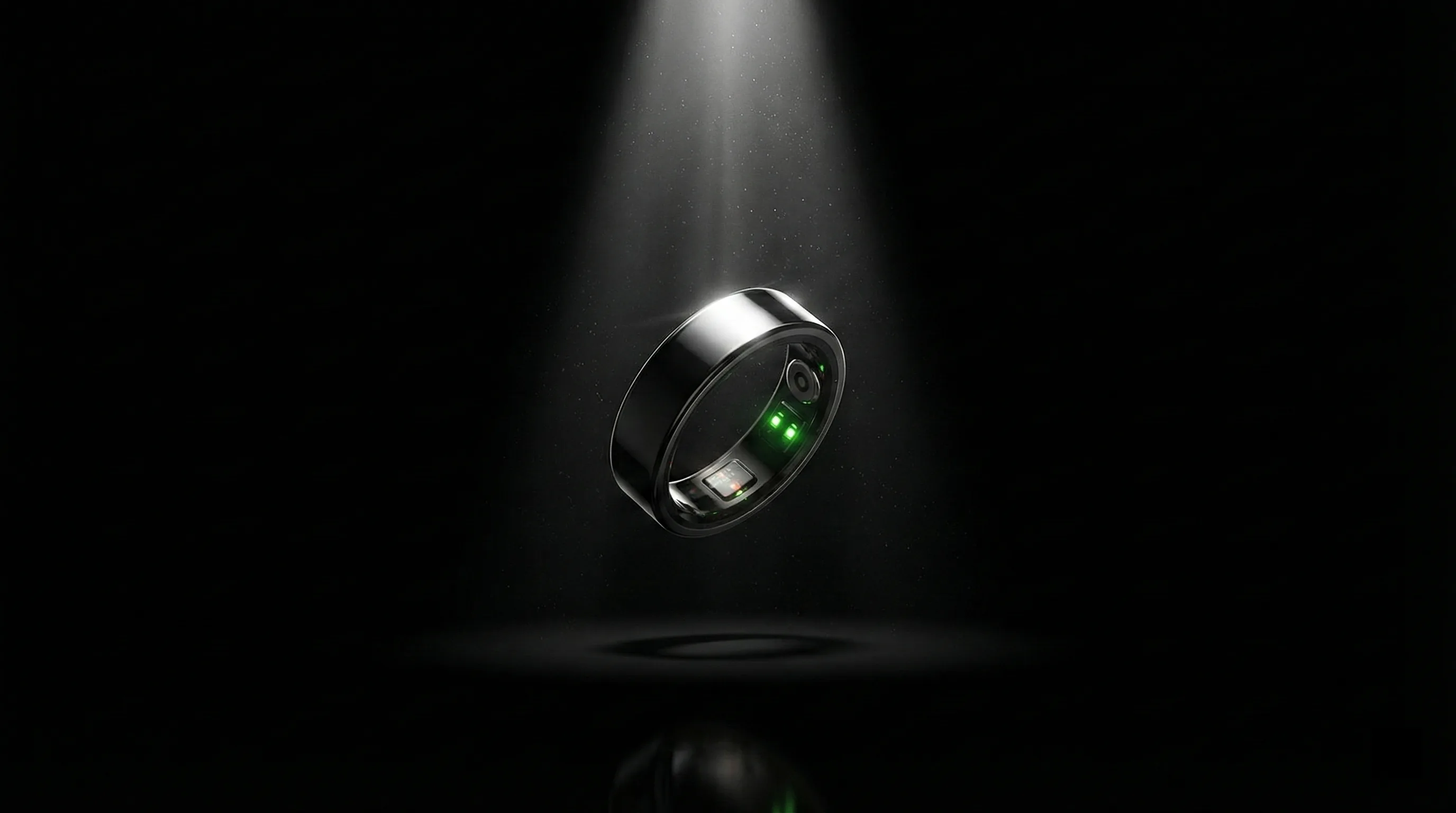 Pulsyn Rune 1 smart ring in polished titanium silver, shown against a soft studio backdrop